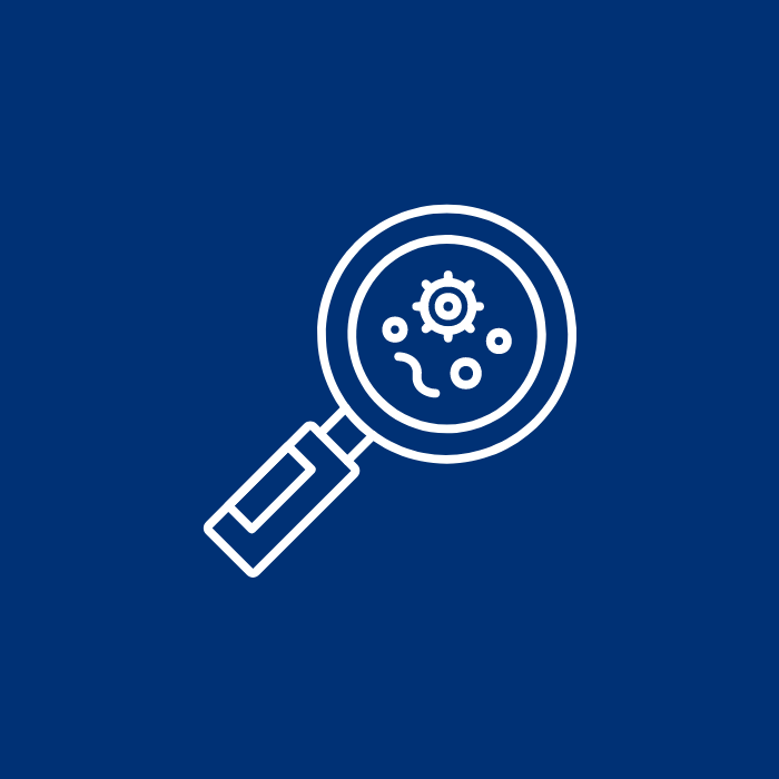 Magnifying glass over gear and circuit, representing a detailed technological inspection